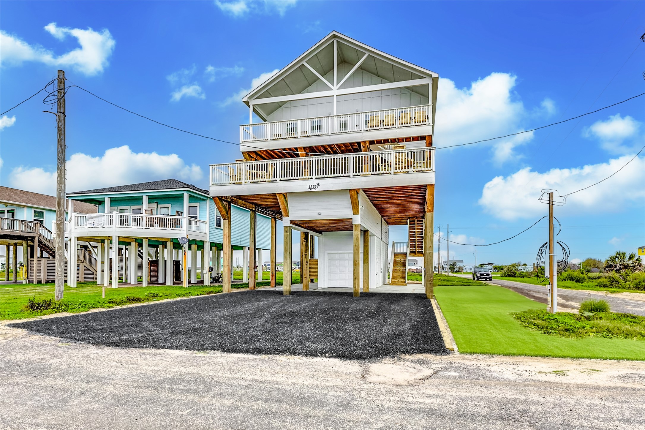 1395 Keith Avenue Port Bolivar, TX 77617 - Photo 6 of 38 a front view of a house with a yard