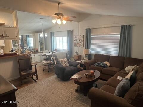 501 Arnold Way Coolidge, AZ 85128 - Photo 3 of 15 a living room with furniture a chandelier and a window