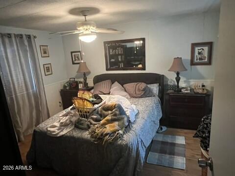 501 Arnold Way Coolidge, AZ 85128 - Photo 7 of 15 a bedroom with a bed and a window