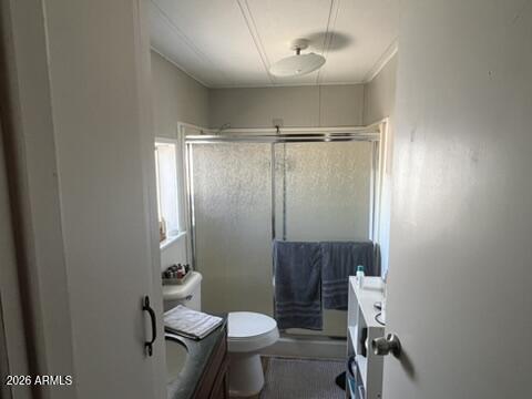 501 Arnold Way Coolidge, AZ 85128 - Photo 8 of 15 a bathroom with a toilet and a shower