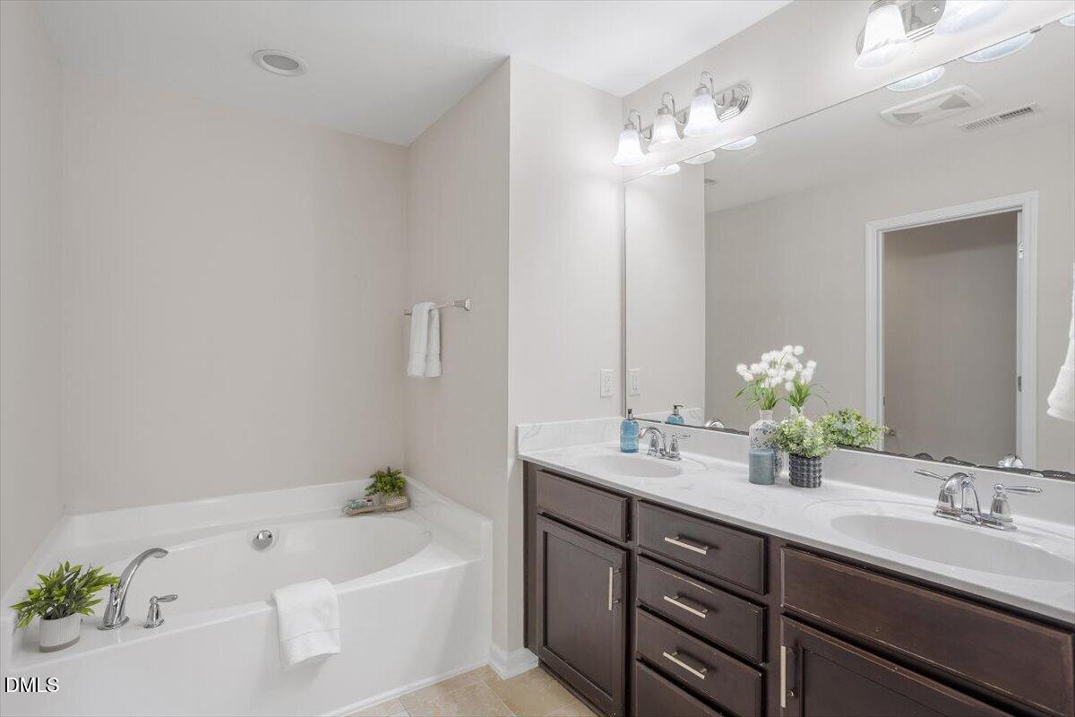 141 Skyros Loop Cary, NC 27519 - Photo 28 of 36 Primary bath
