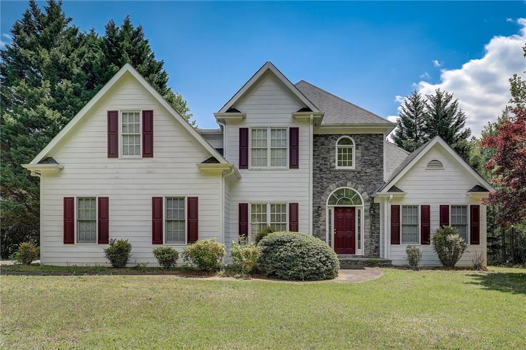 5770 Julian Road Gainesville, GA 30506 - Photo 1 of 1 a front view of a house with a yard