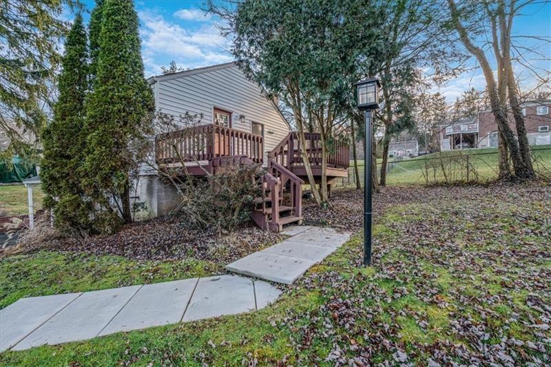 2057 Washington Road, Unit B Pittsburgh, PA 15241 - Photo 2 of 9 a backyard of a house with lots of green space