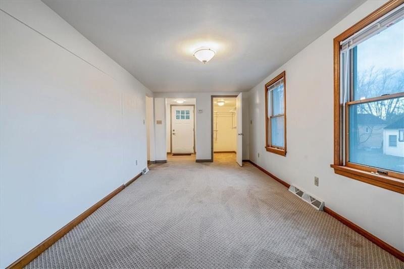 2057 Washington Road, Unit B Pittsburgh, PA 15241 - Photo 6 of 9 an empty room with windows