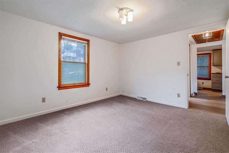 2057 Washington Road, Unit B Pittsburgh, PA 15241 - Photo 8 of 9 an empty room with a window