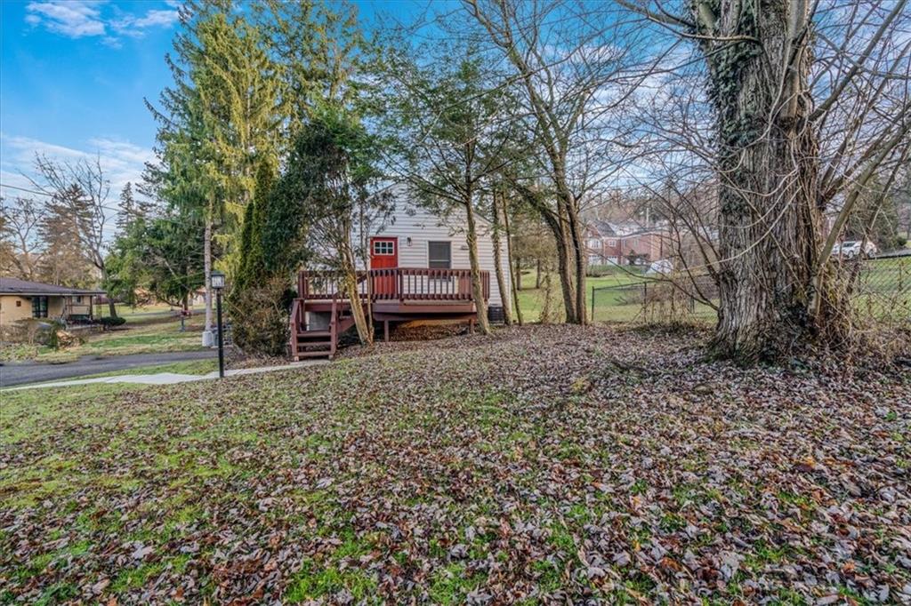 2057 Washington Road, Unit B Pittsburgh, PA 15241 - Photo 9 of 9 a backyard of a house with lots of green space