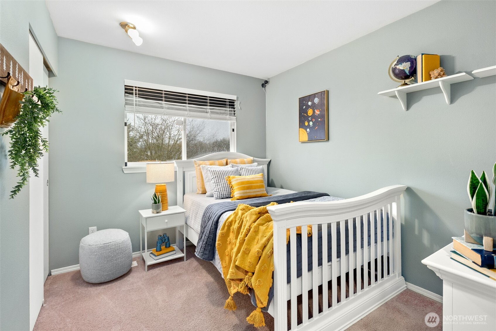 17639 Stanton Street Southeast Monroe, WA 98272 - Photo 11 of 24 a bedroom with a bed and a window