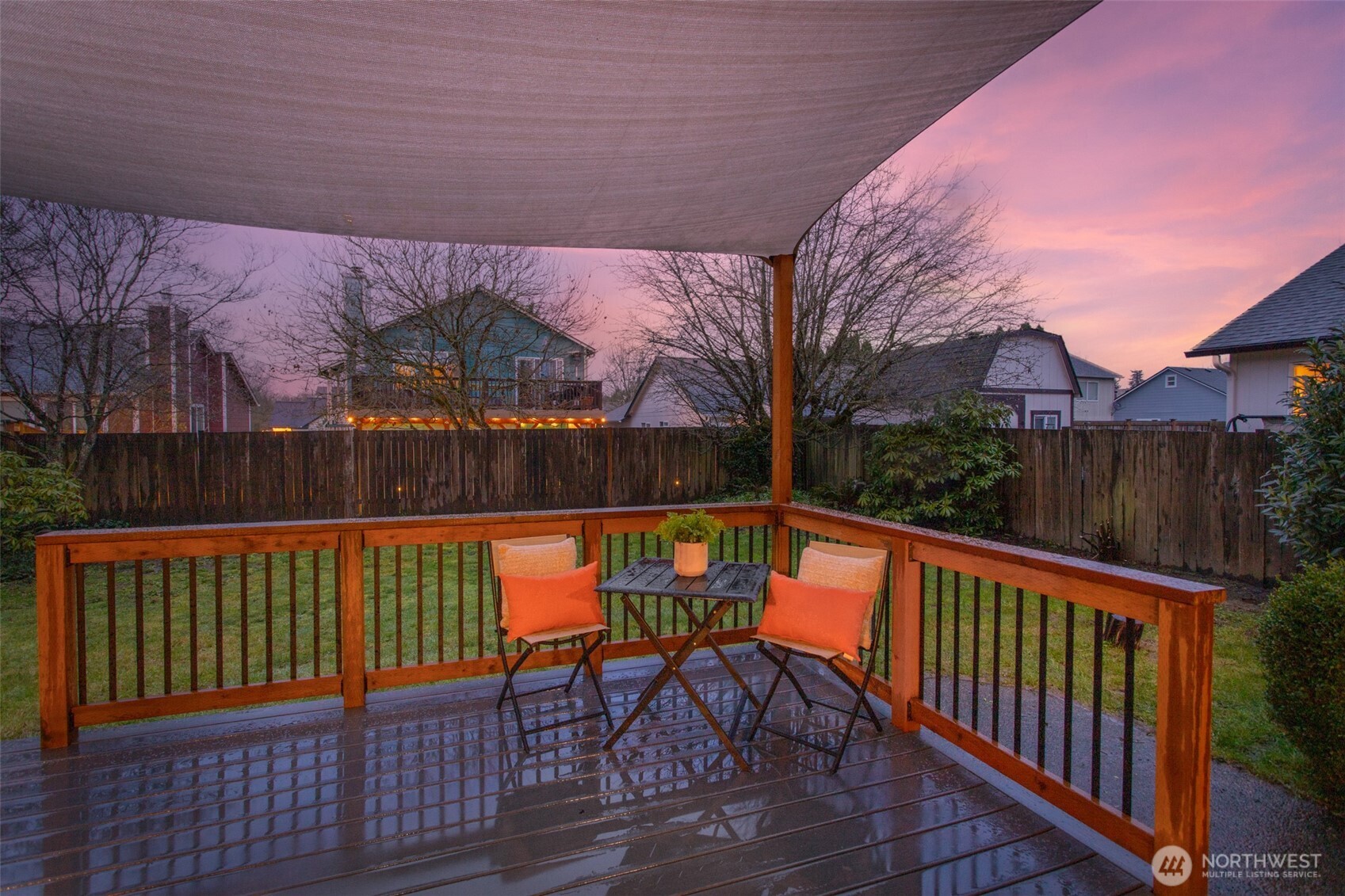 17639 Stanton Street Southeast Monroe, WA 98272 - Photo 18 of 24 a balcony with wooden floor and outdoor seating