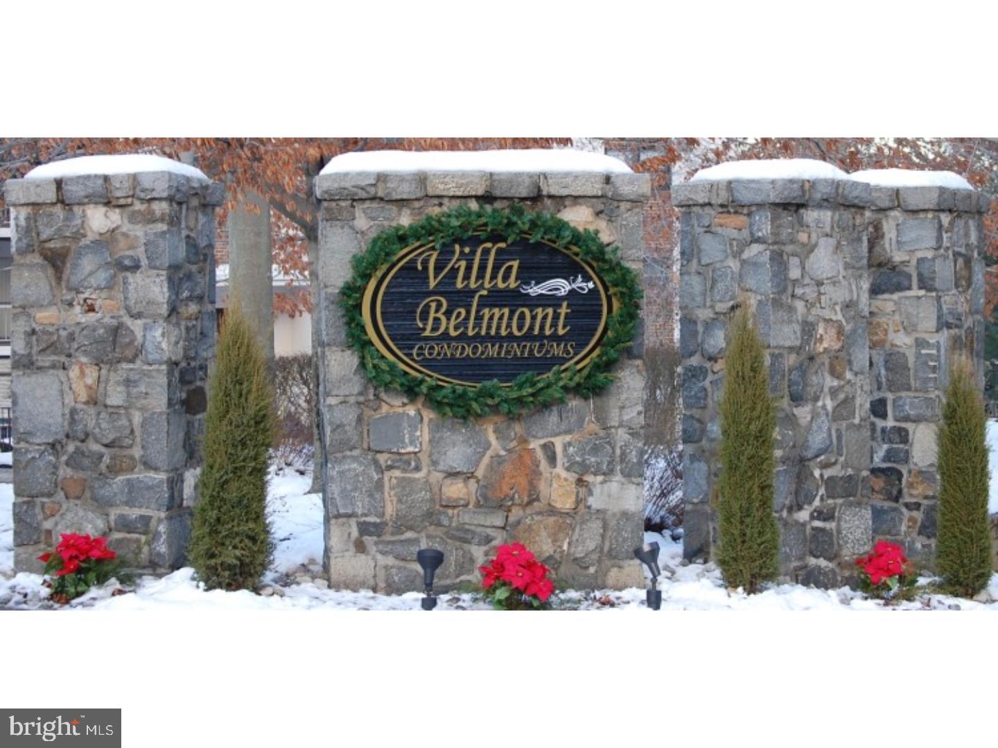 a street sign on a brick wall