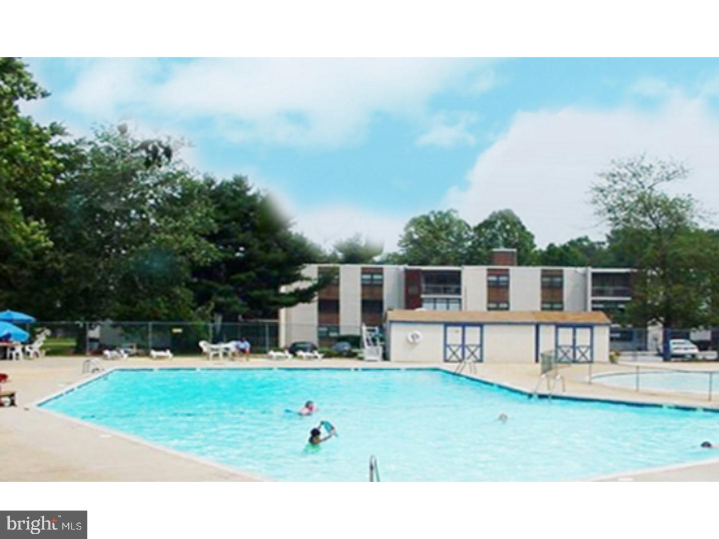64 Welsh Tract Road, Unit 301 Newark, DE 19713 - Photo 15 of 15 a front view of a house with garden