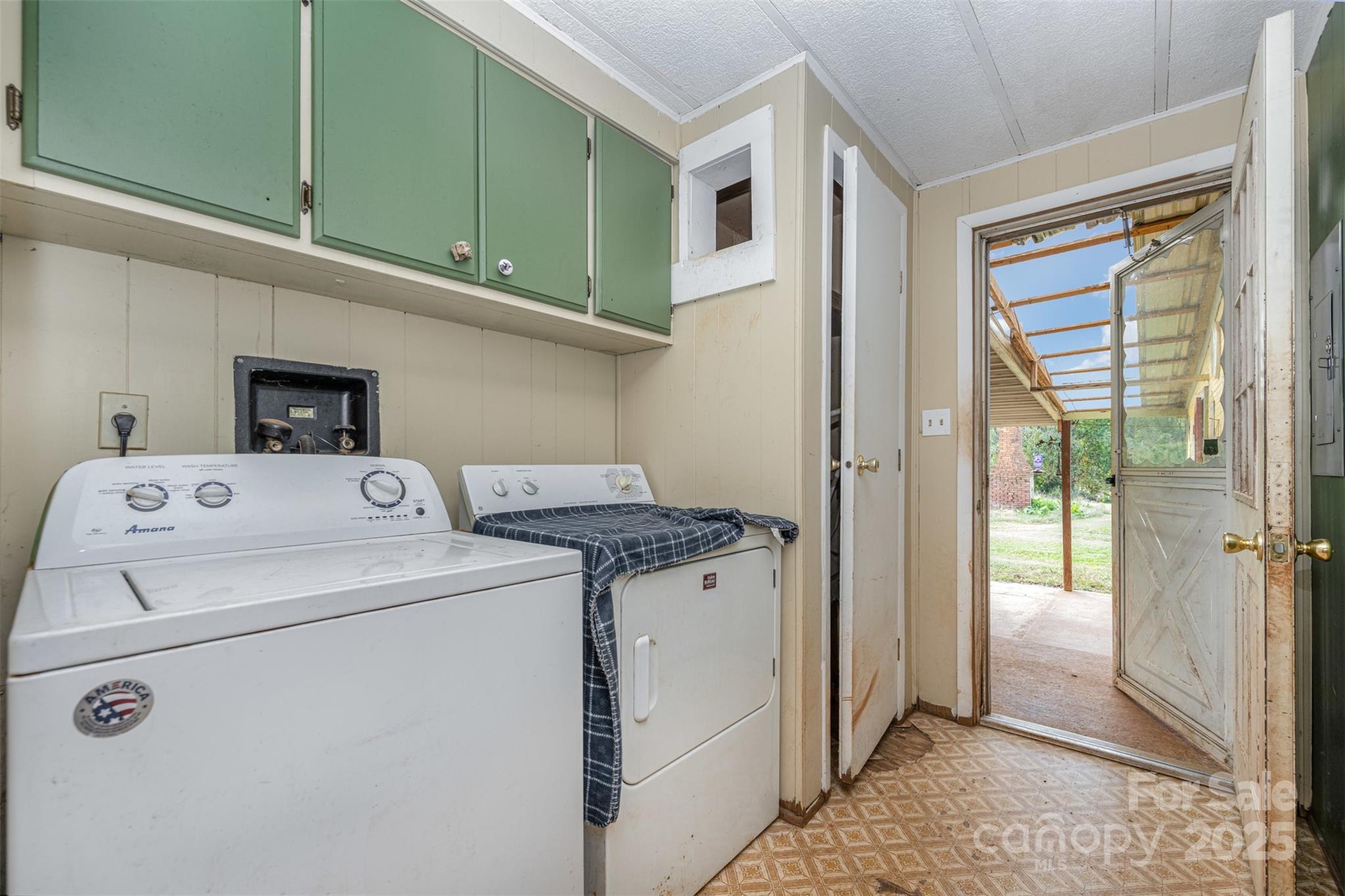 316 Josey Road Statesville, NC 28625 - Photo 15 of 27 a utility room with dryer and washer