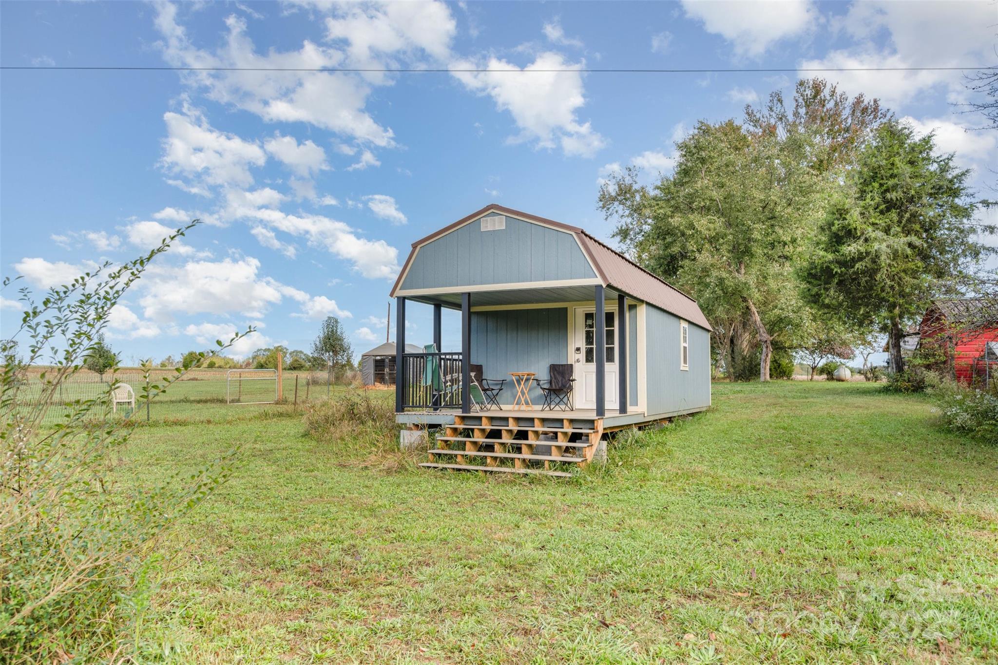 316 Josey Road Statesville, NC 28625 - Photo 19 of 27 a front view of a house with garden