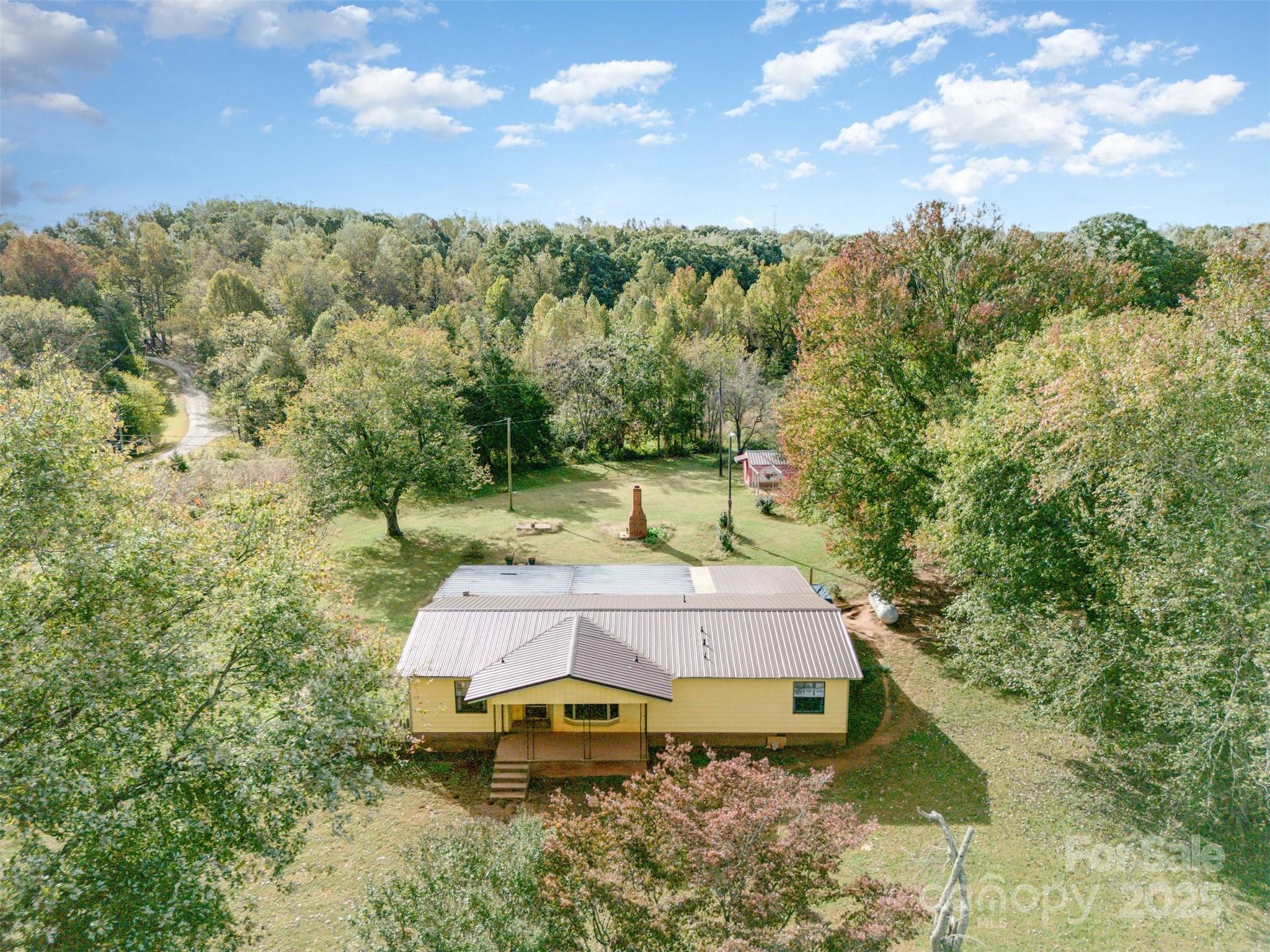 316 Josey Road Statesville, NC 28625 - Photo 26 of 27 a swimming pool with trees in the background
