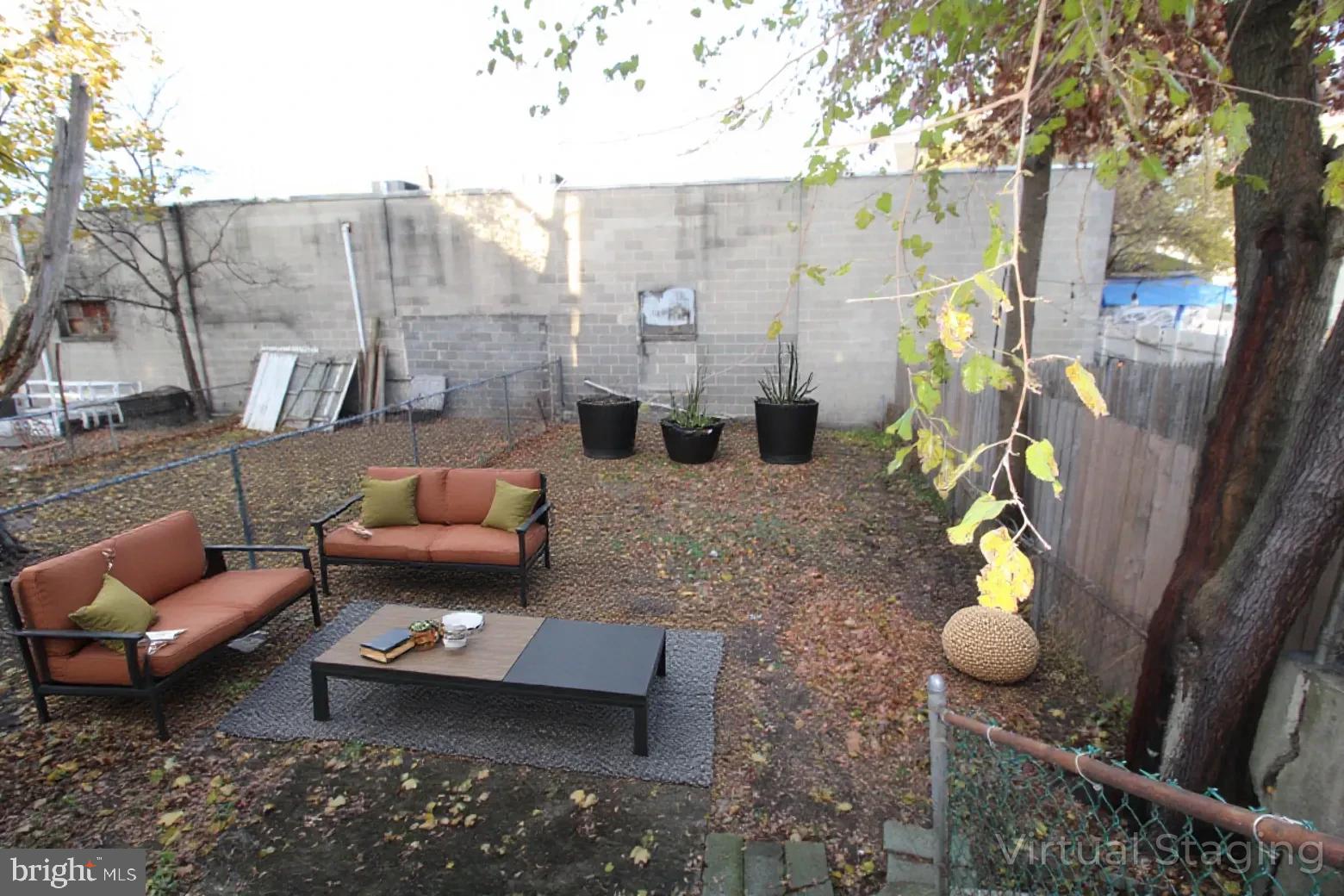 421 Bridgeboro Street Riverside, NJ 08075 - Photo 14 of 19 a view of outdoor seating space and living room