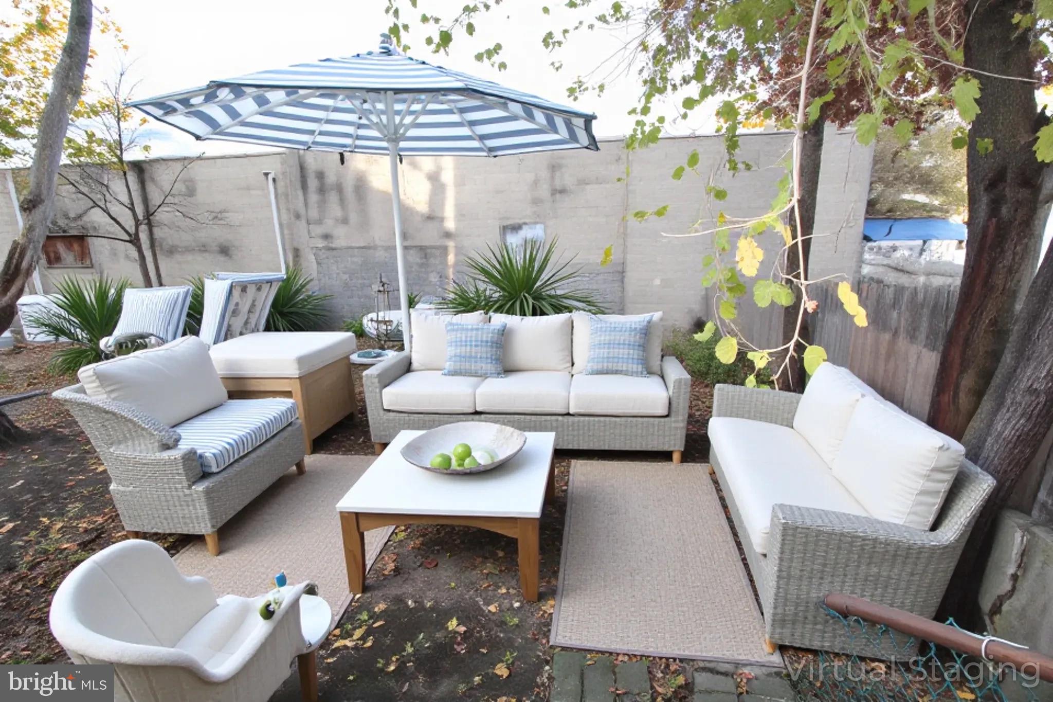 421 Bridgeboro Street Riverside, NJ 08075 - Photo 15 of 19 a living room with furniture and a table