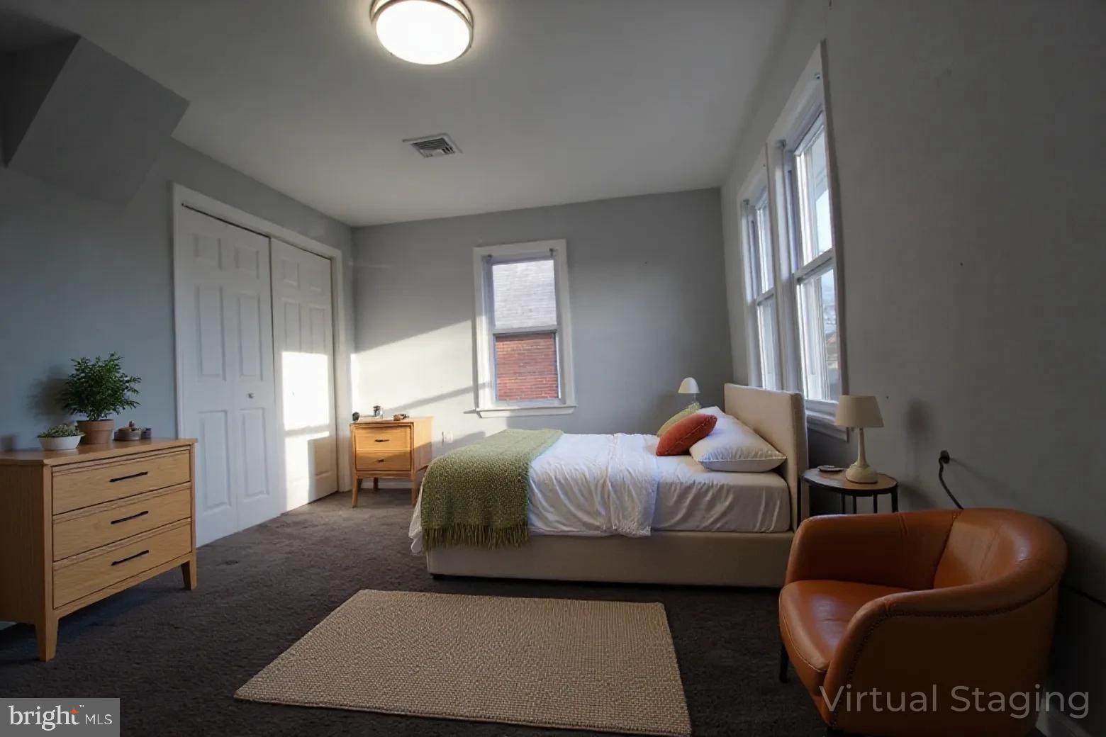 421 Bridgeboro Street Riverside, NJ 08075 - Photo 3 of 19 a bedroom with furniture and window