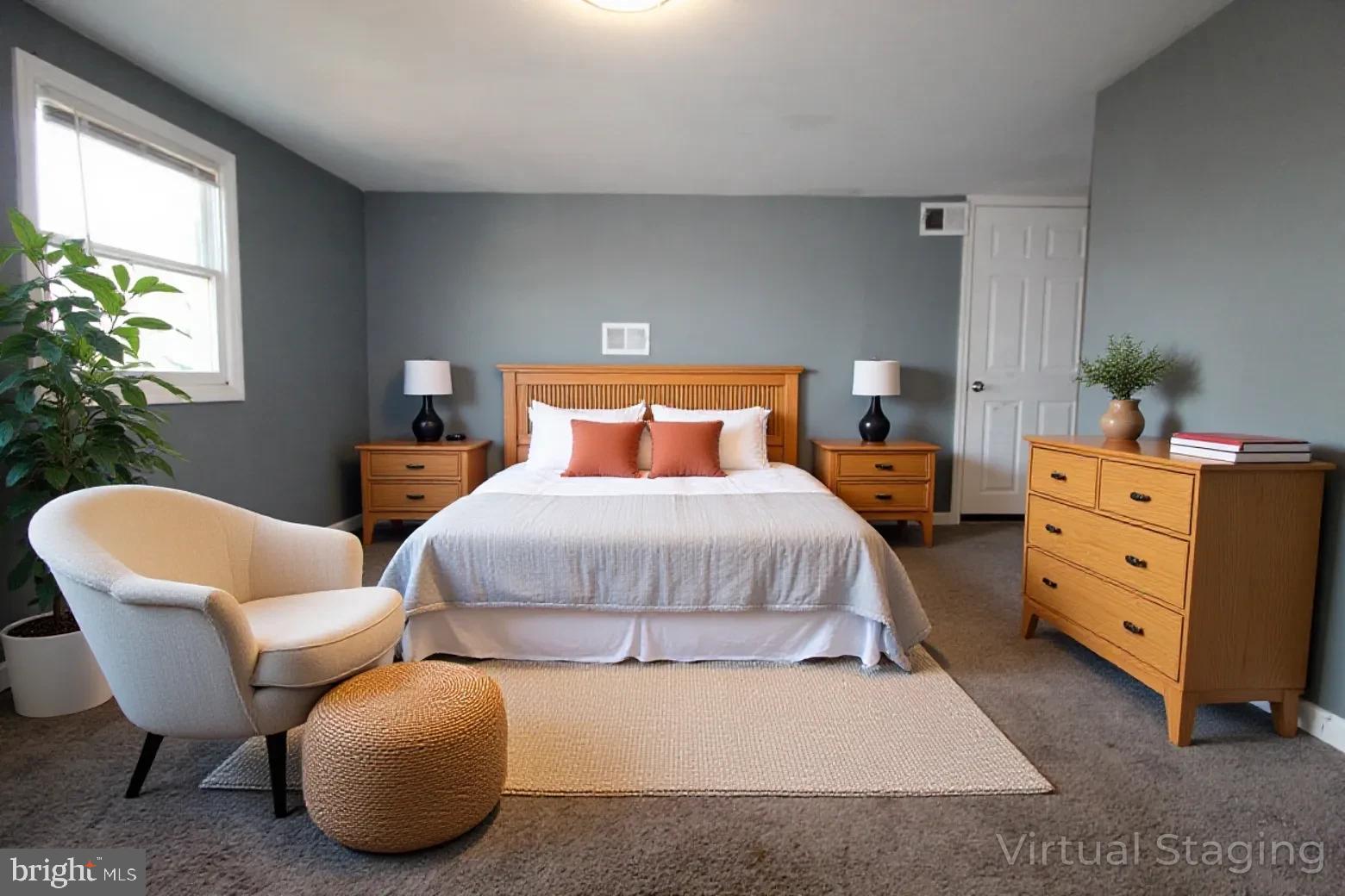 421 Bridgeboro Street Riverside, NJ 08075 - Photo 6 of 19 a bedroom with furniture and a potted plant