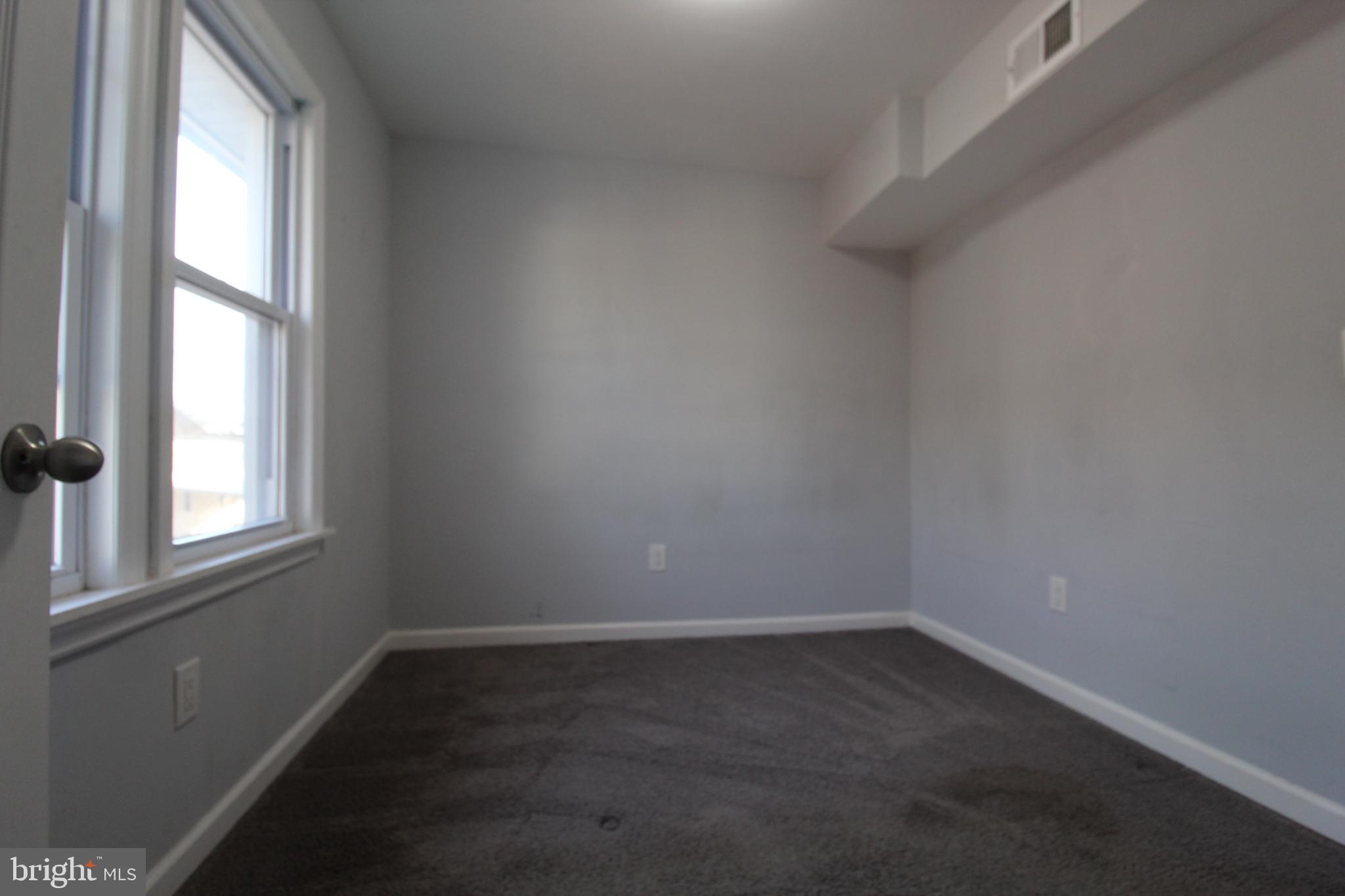 421 Bridgeboro Street Riverside, NJ 08075 - Photo 10 of 19 an empty room with a window