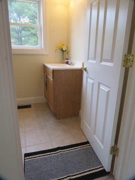 13 Portland Road Gray, ME 04039 - Photo 14 of 34 First floor bathroom vanity. Window...