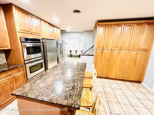a view of a kitchen with a sink