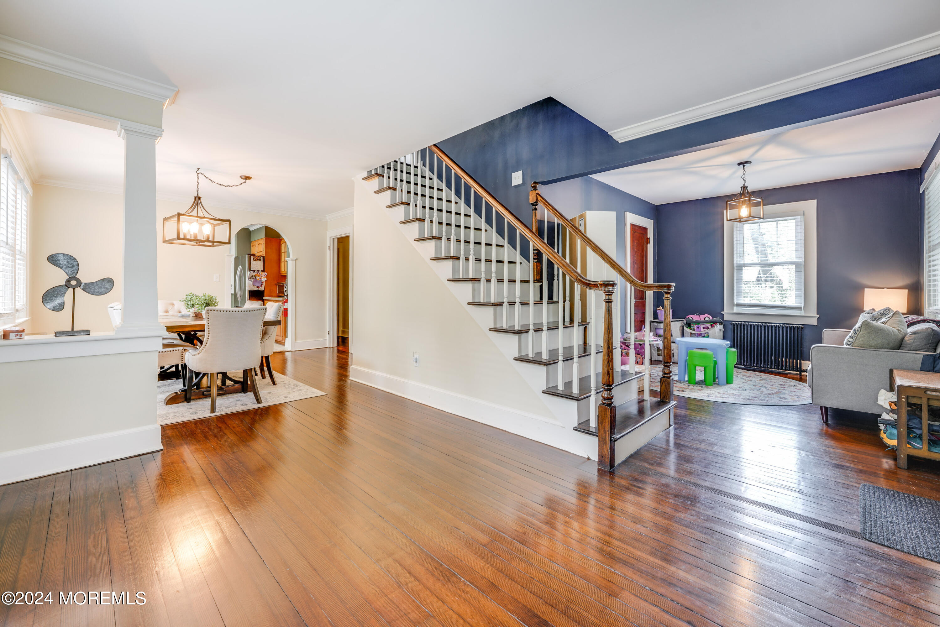 500 Locust Point Road Rumson, NJ 07760 - Photo 12 of 48 a living room with furniture and a wooden floor