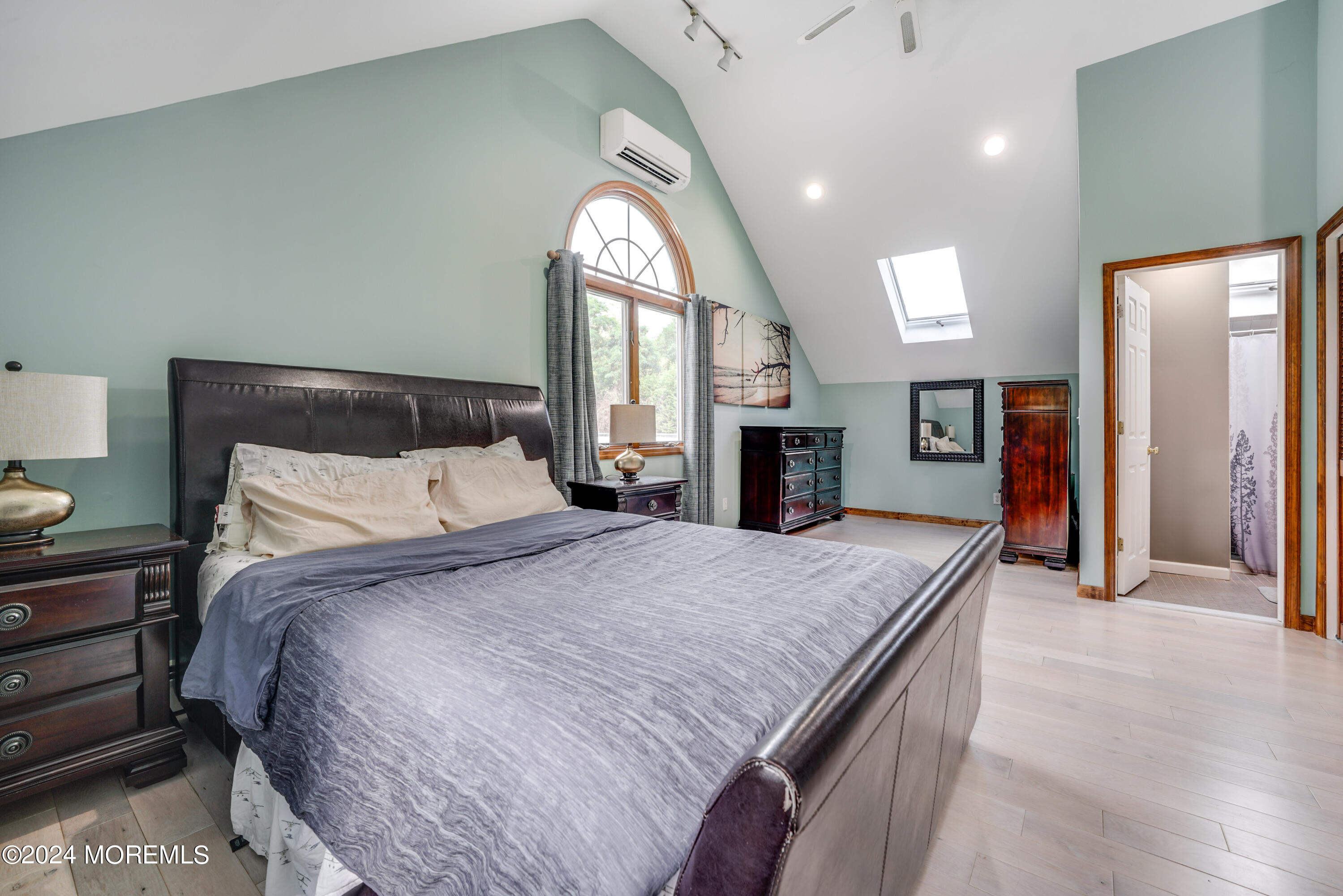 500 Locust Point Road Rumson, NJ 07760 - Photo 16 of 48 a spacious bedroom with a bed and a dresser