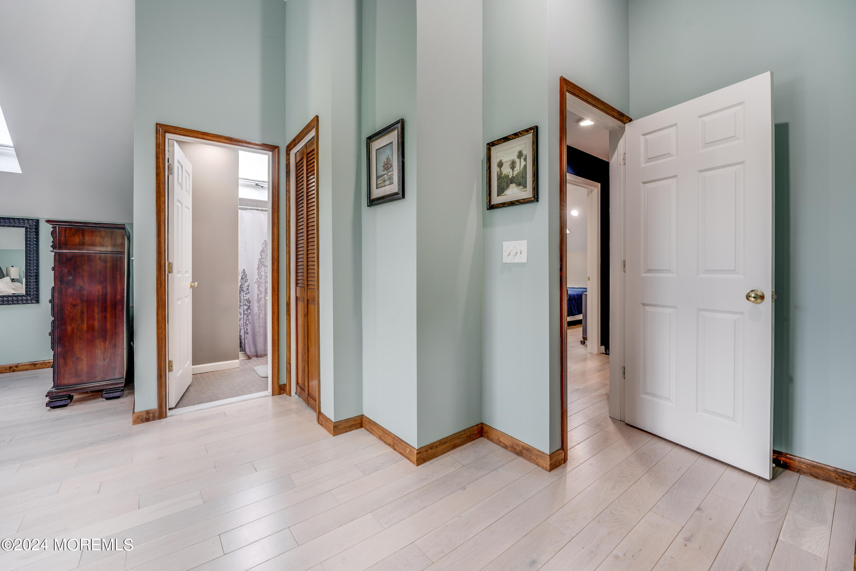 500 Locust Point Road Rumson, NJ 07760 - Photo 17 of 48 a view of an empty room with wooden floor and closet
