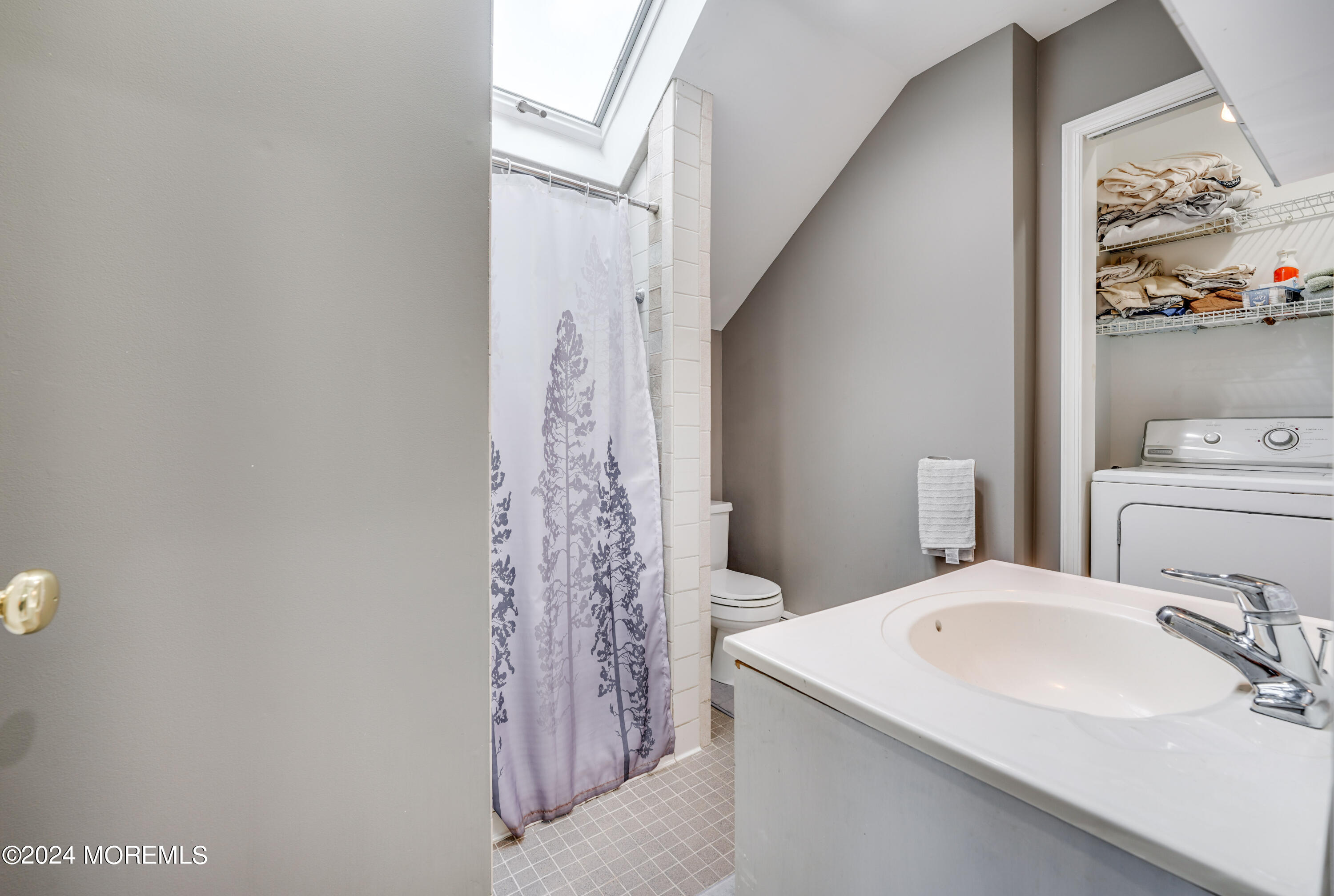 500 Locust Point Road Rumson, NJ 07760 - Photo 18 of 48 a bathroom with a sink and a mirror