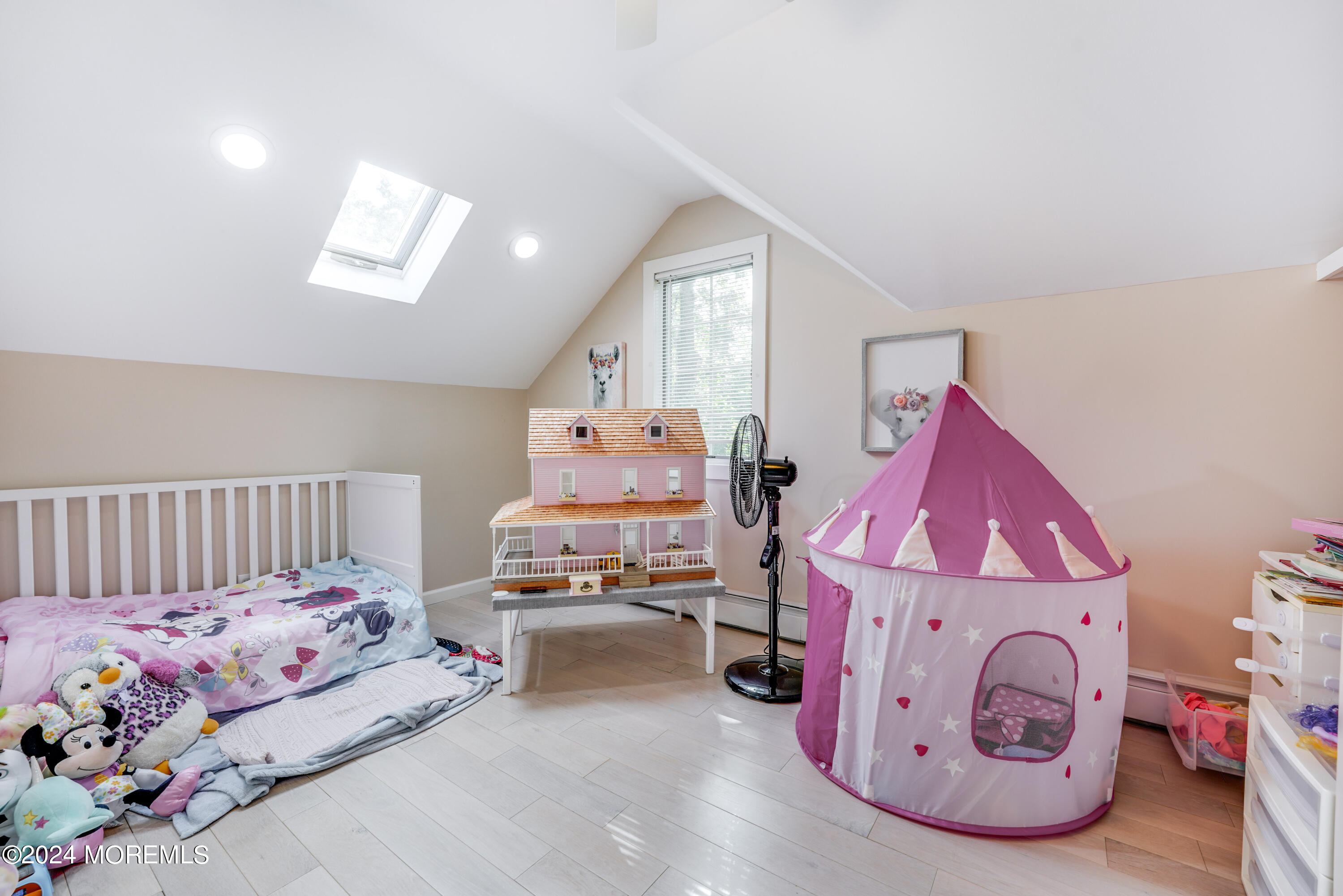 500 Locust Point Road Rumson, NJ 07760 - Photo 20 of 48 a bedroom with bed and window