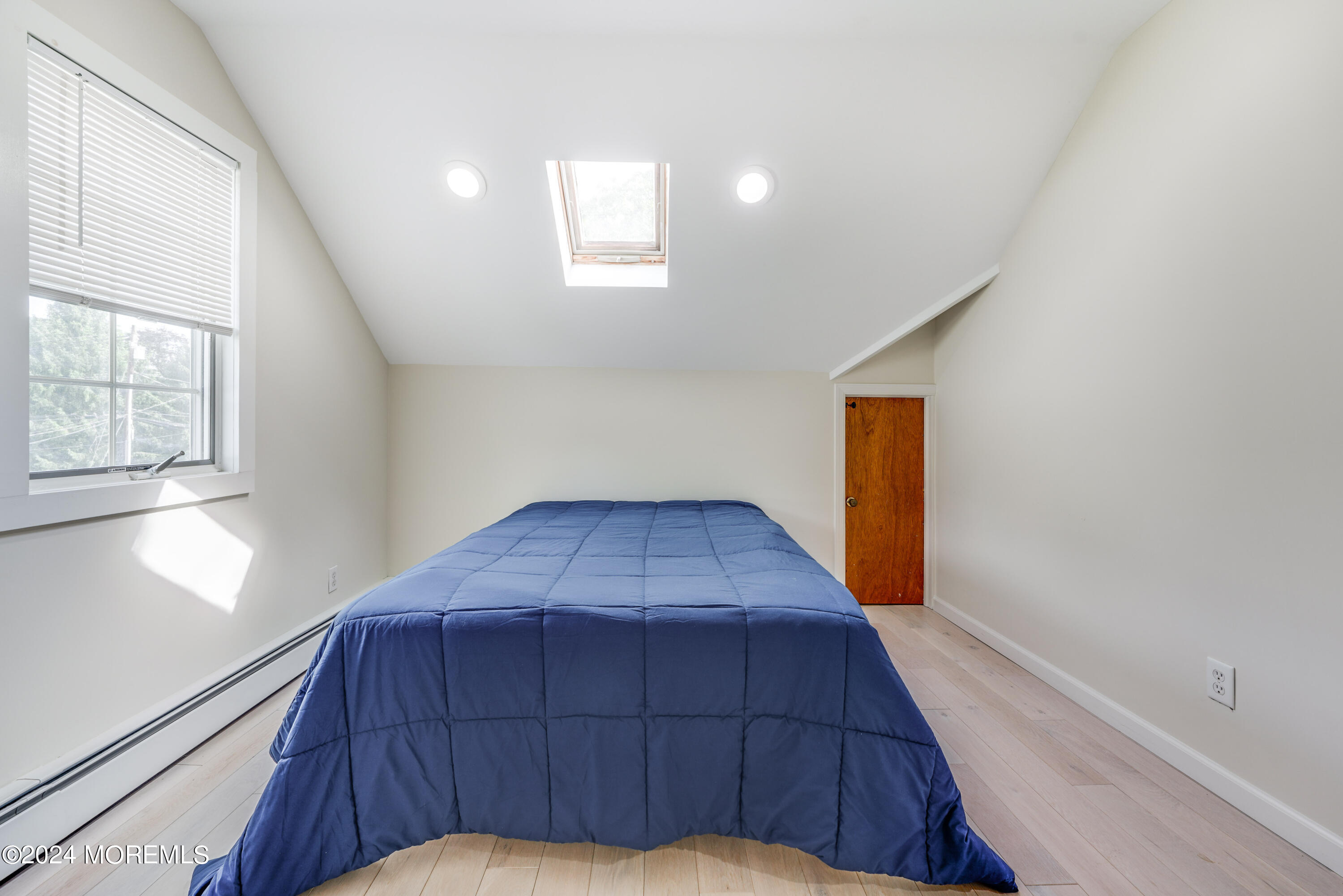 500 Locust Point Road Rumson, NJ 07760 - Photo 25 of 48 a view of a room with wooden floor and staircase