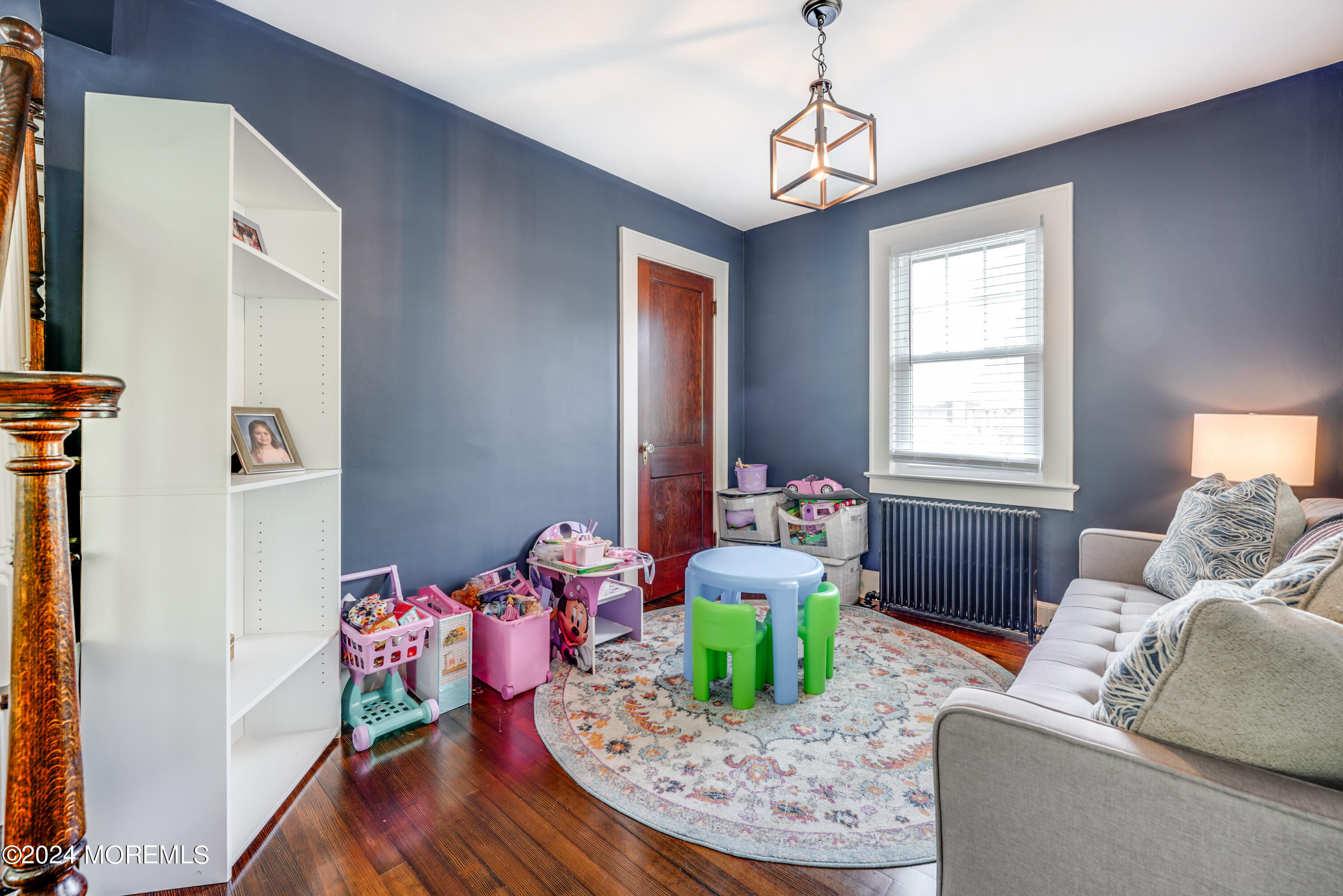 500 Locust Point Road Rumson, NJ 07760 - Photo 27 of 48 a living room with furniture and a wooden floor