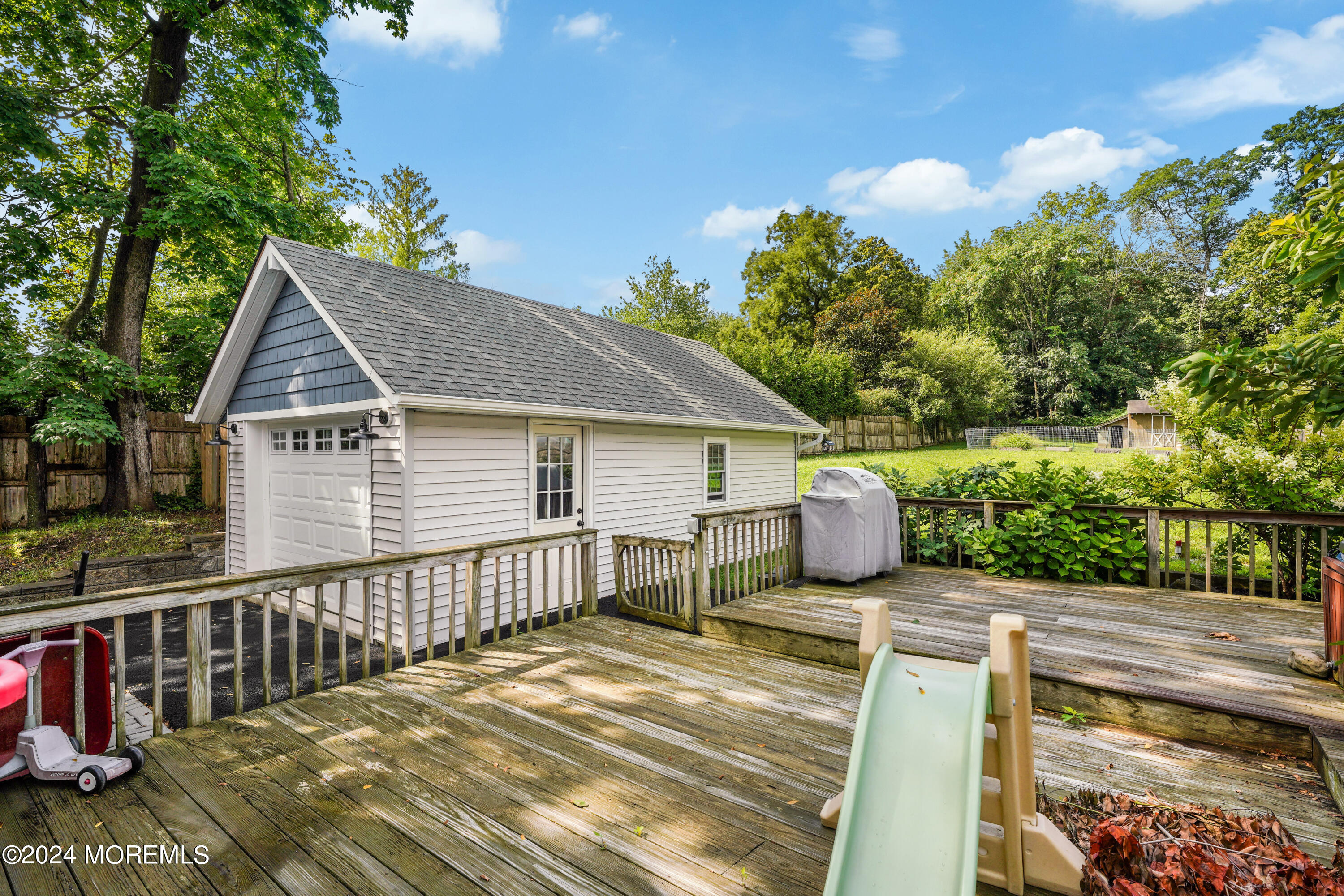 500 Locust Point Road Rumson, NJ 07760 - Photo 38 of 48 a view of a house with a patio