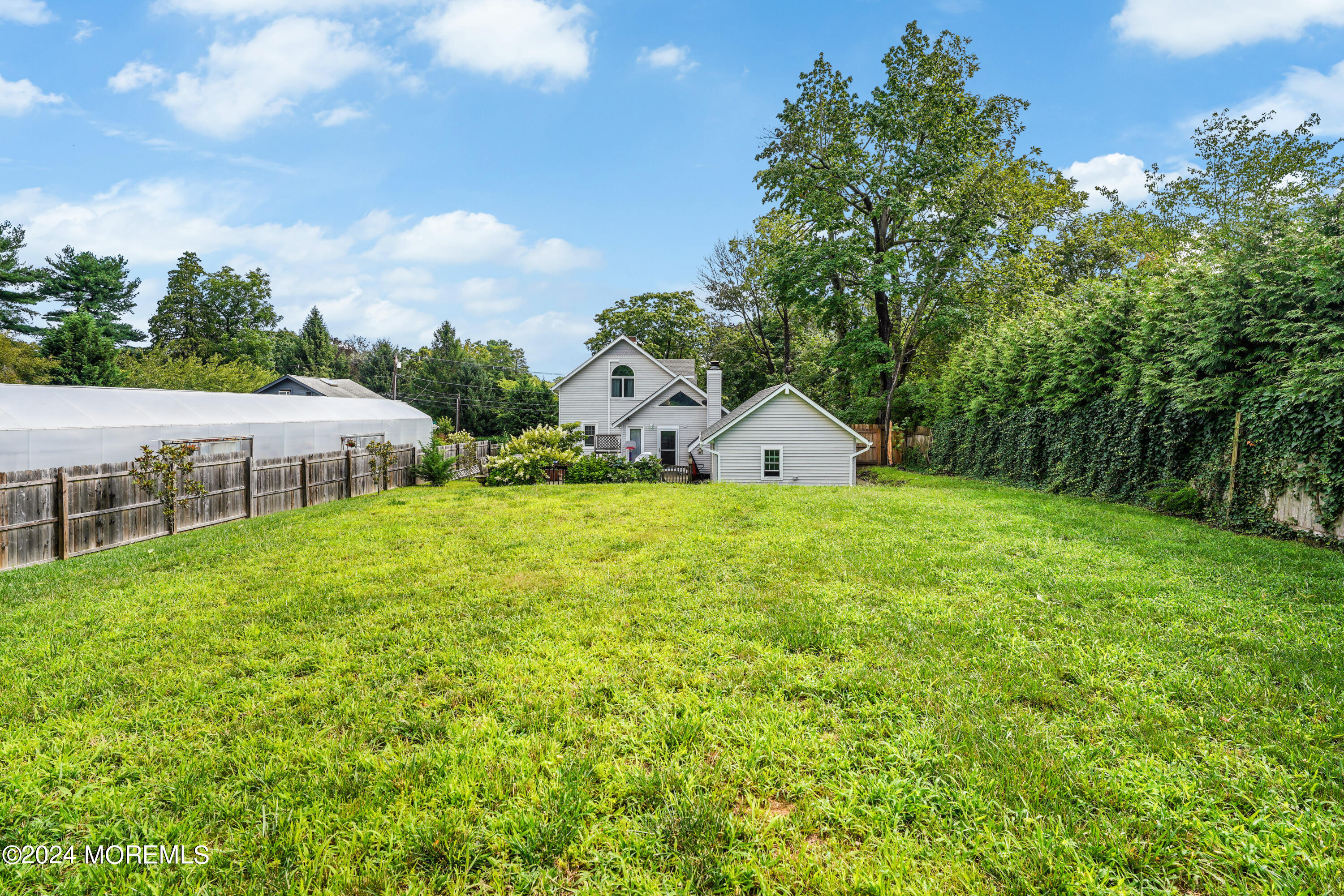 500 Locust Point Road Rumson, NJ 07760 - Photo 42 of 48 a house view with a garden space