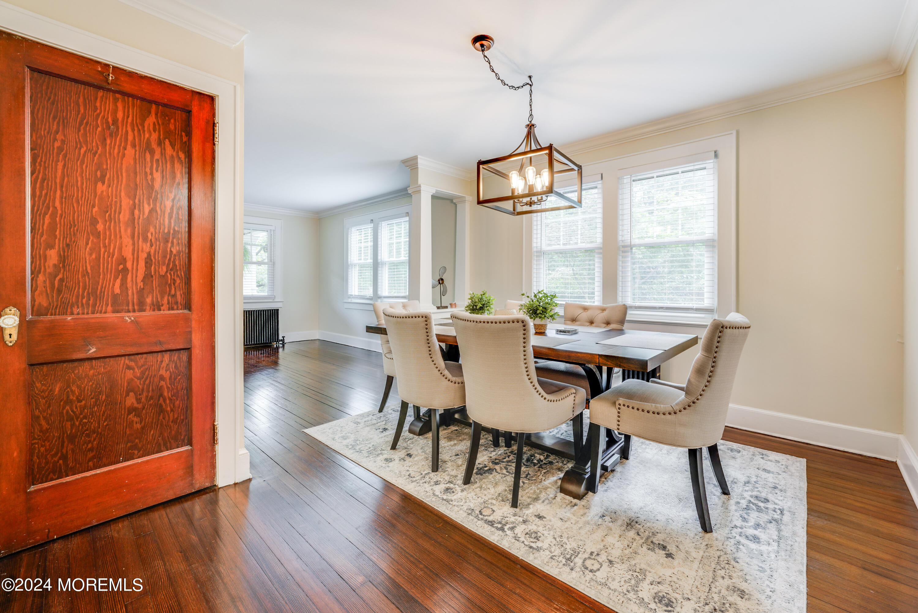 500 Locust Point Road Rumson, NJ 07760 - Photo 10 of 48 a view of a dining room with furniture window and wooden floor