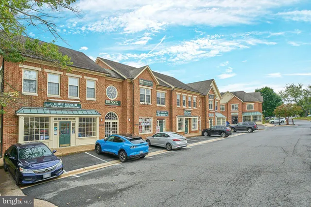 a view of a street with sitting area