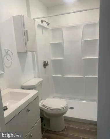 a bathroom with a toilet and a sink