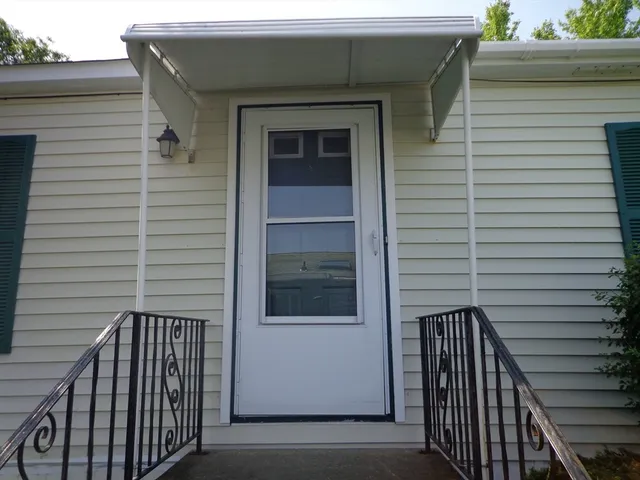 a view of a house with a deck