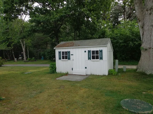 a view of a backyard with a garden