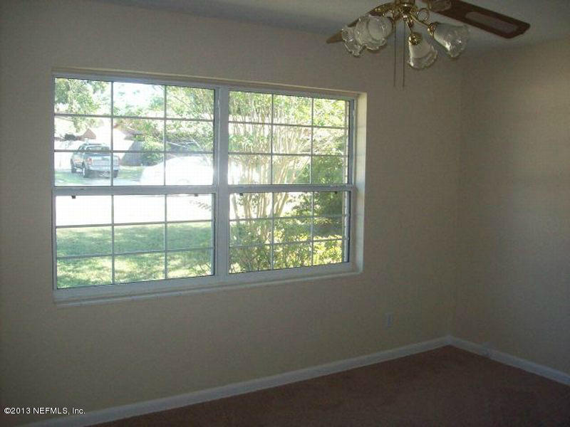 3750 Heath Road Jacksonville, FL 32277 - Photo 5 of 12 an empty room with a window