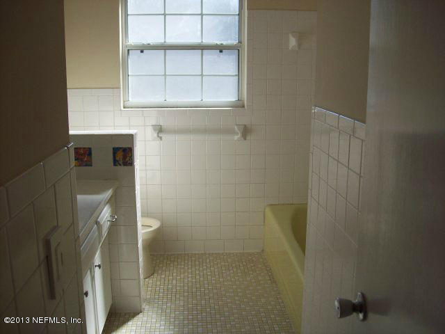 3750 Heath Road Jacksonville, FL 32277 - Photo 6 of 12 a bathroom with a shower