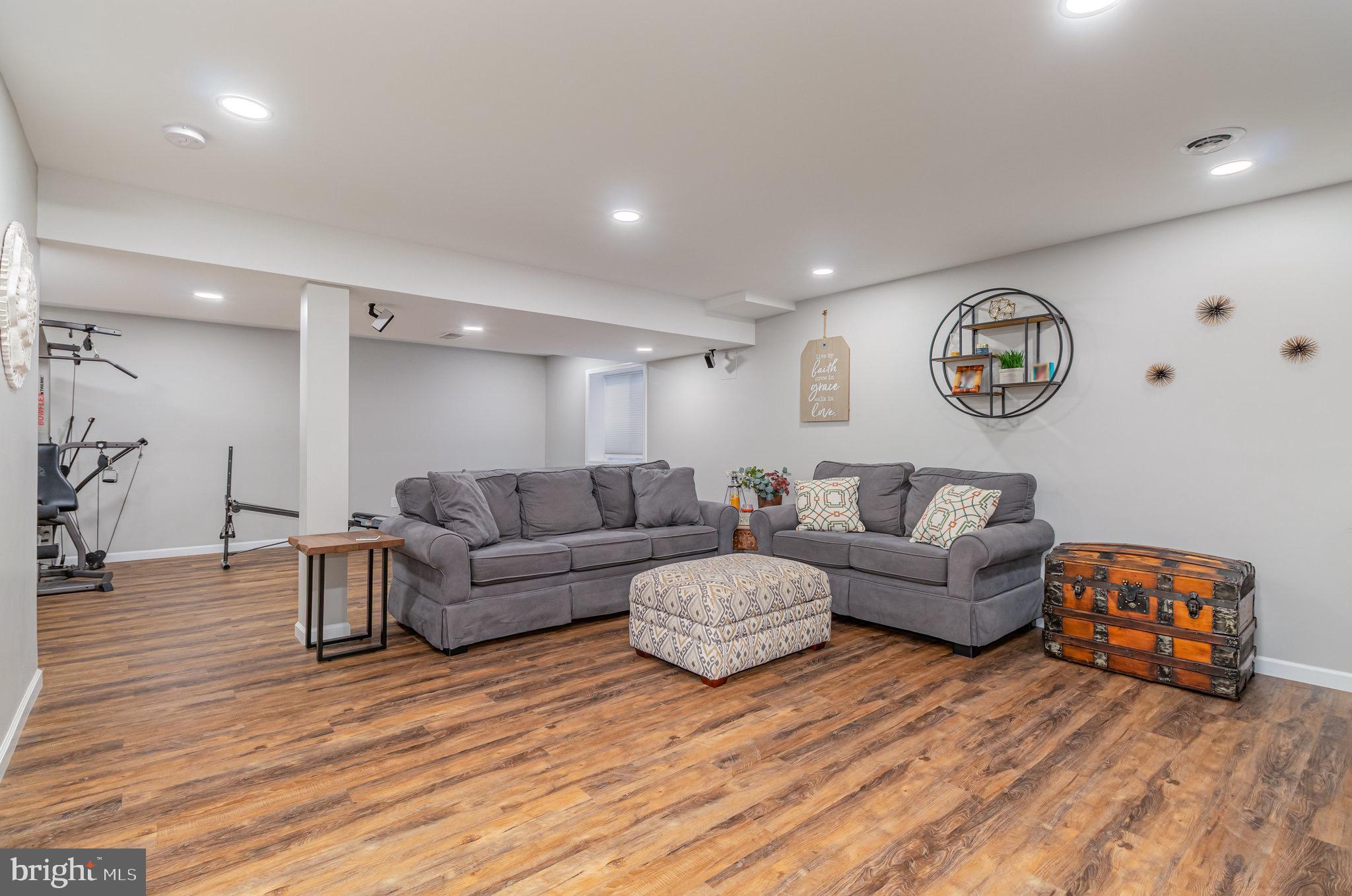 1799 Campus Road Elizabethtown, PA 17022 - Photo 15 of 28 a living room with furniture and a wooden floor