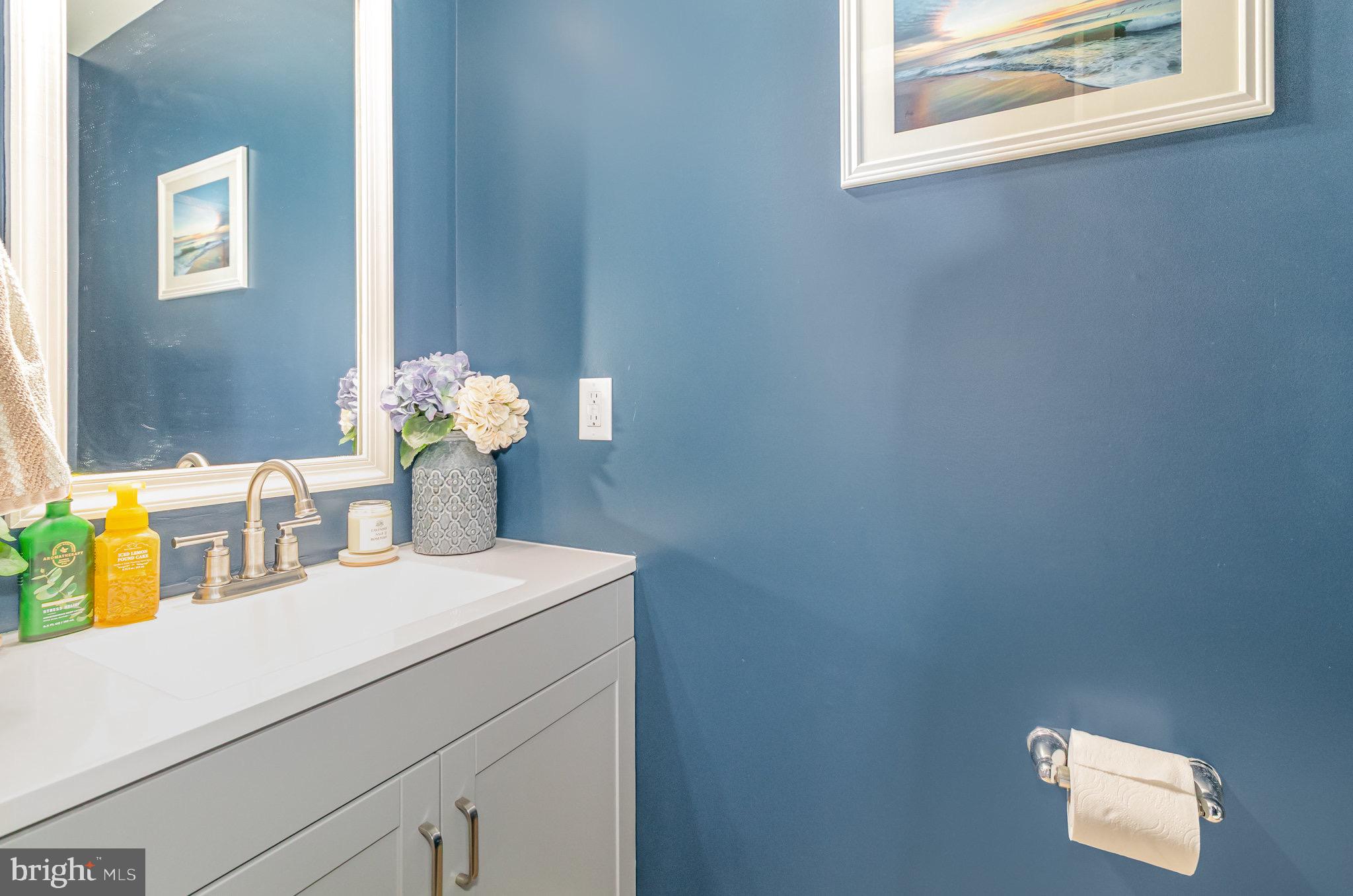 1799 Campus Road Elizabethtown, PA 17022 - Photo 18 of 28 a bathroom with a sink vanity and a mirror