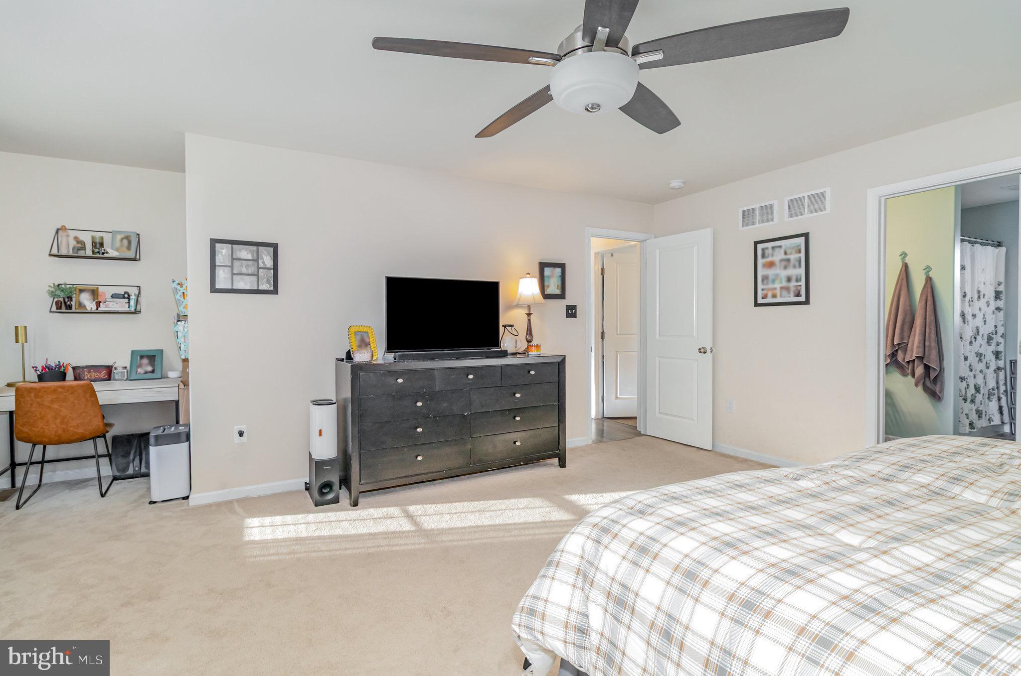 1799 Campus Road Elizabethtown, PA 17022 - Photo 21 of 28 a bedroom with a bed and a flat screen tv