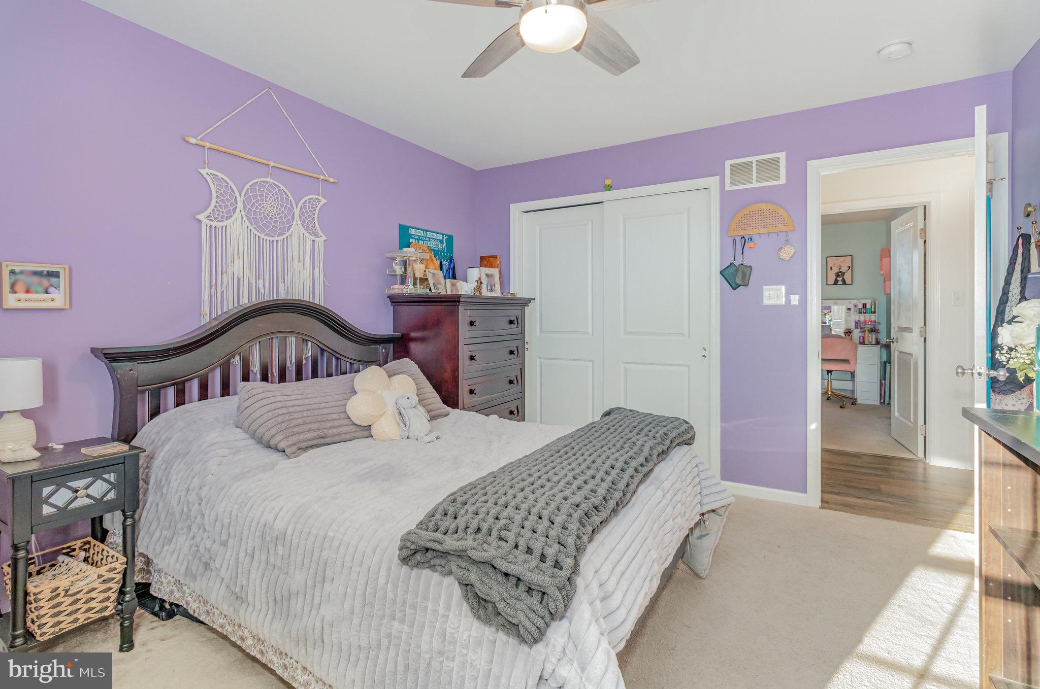 1799 Campus Road Elizabethtown, PA 17022 - Photo 26 of 28 a bedroom with a bed and a chandelier