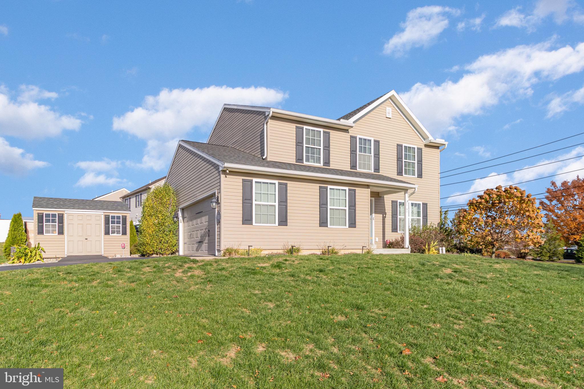 1799 Campus Road Elizabethtown, PA 17022 - Photo 3 of 28 a front view of a house with a yard