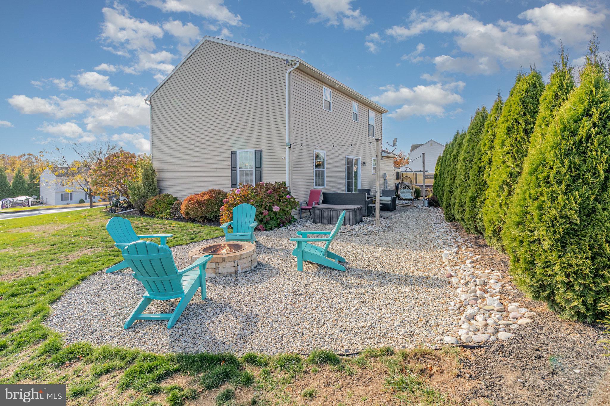 1799 Campus Road Elizabethtown, PA 17022 - Photo 6 of 28 a view of a chairs and table in backyard