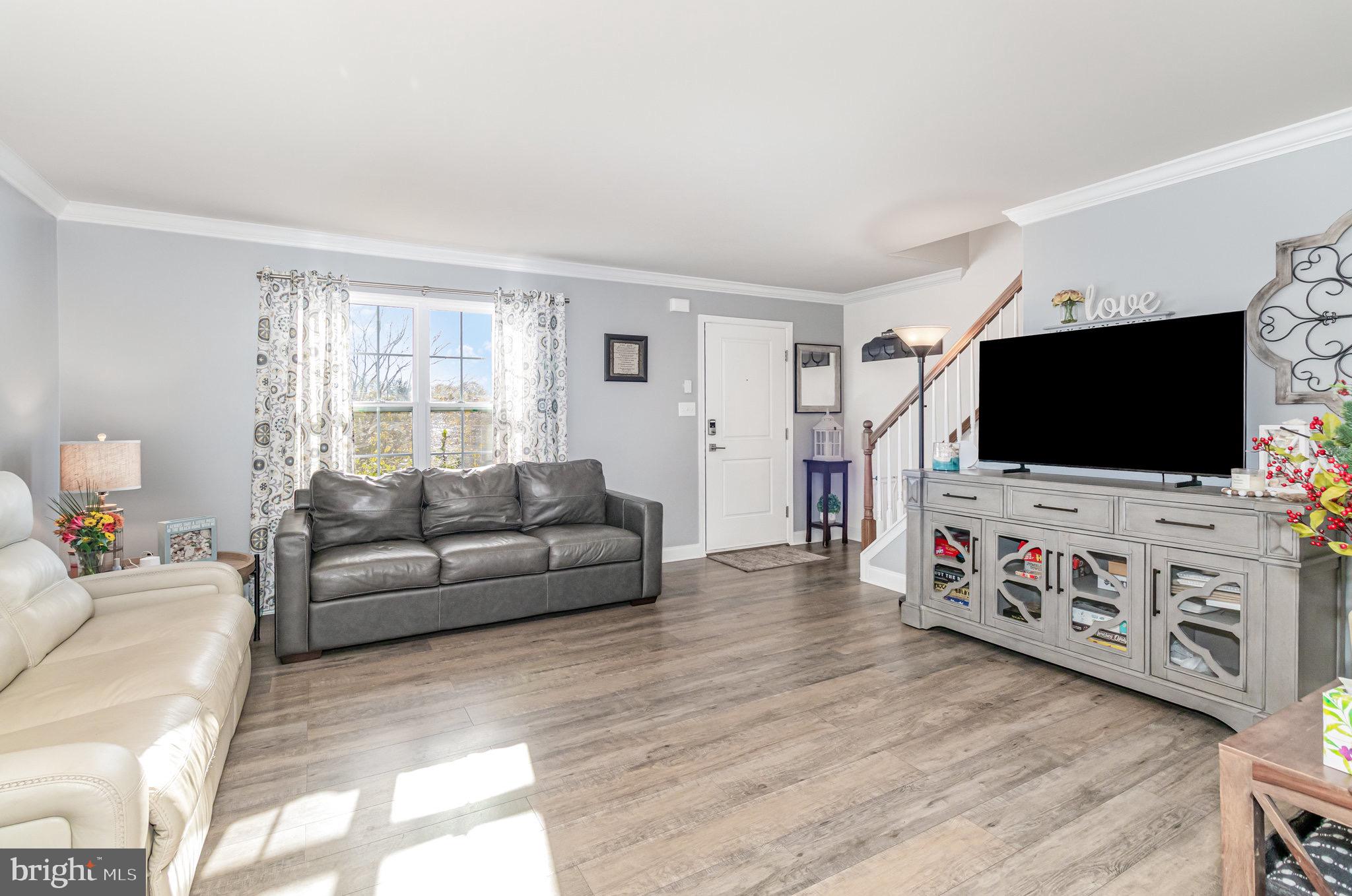 1799 Campus Road Elizabethtown, PA 17022 - Photo 8 of 28 a living room with furniture and a flat screen tv