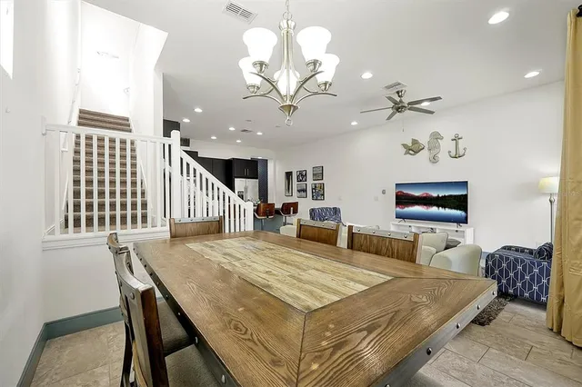 a kitchen with granite countertop a counter space appliances and cabinets