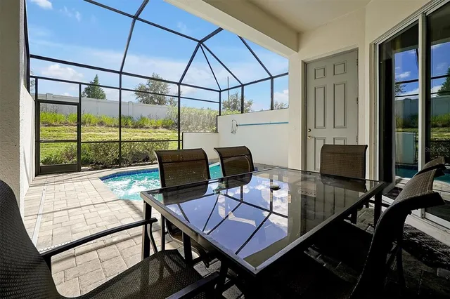 a view of staircase with white walls