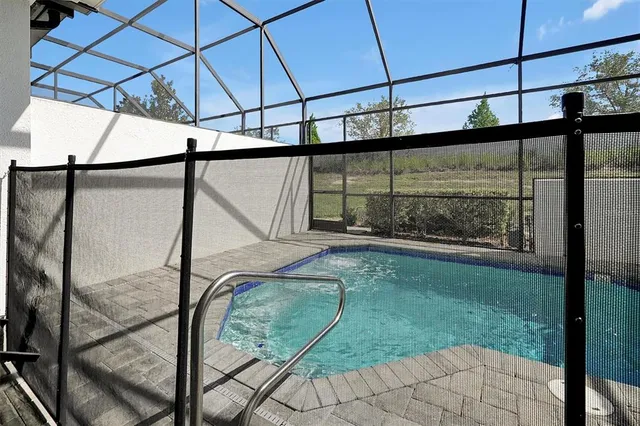 a bathroom with a granite countertop sink mirror and double